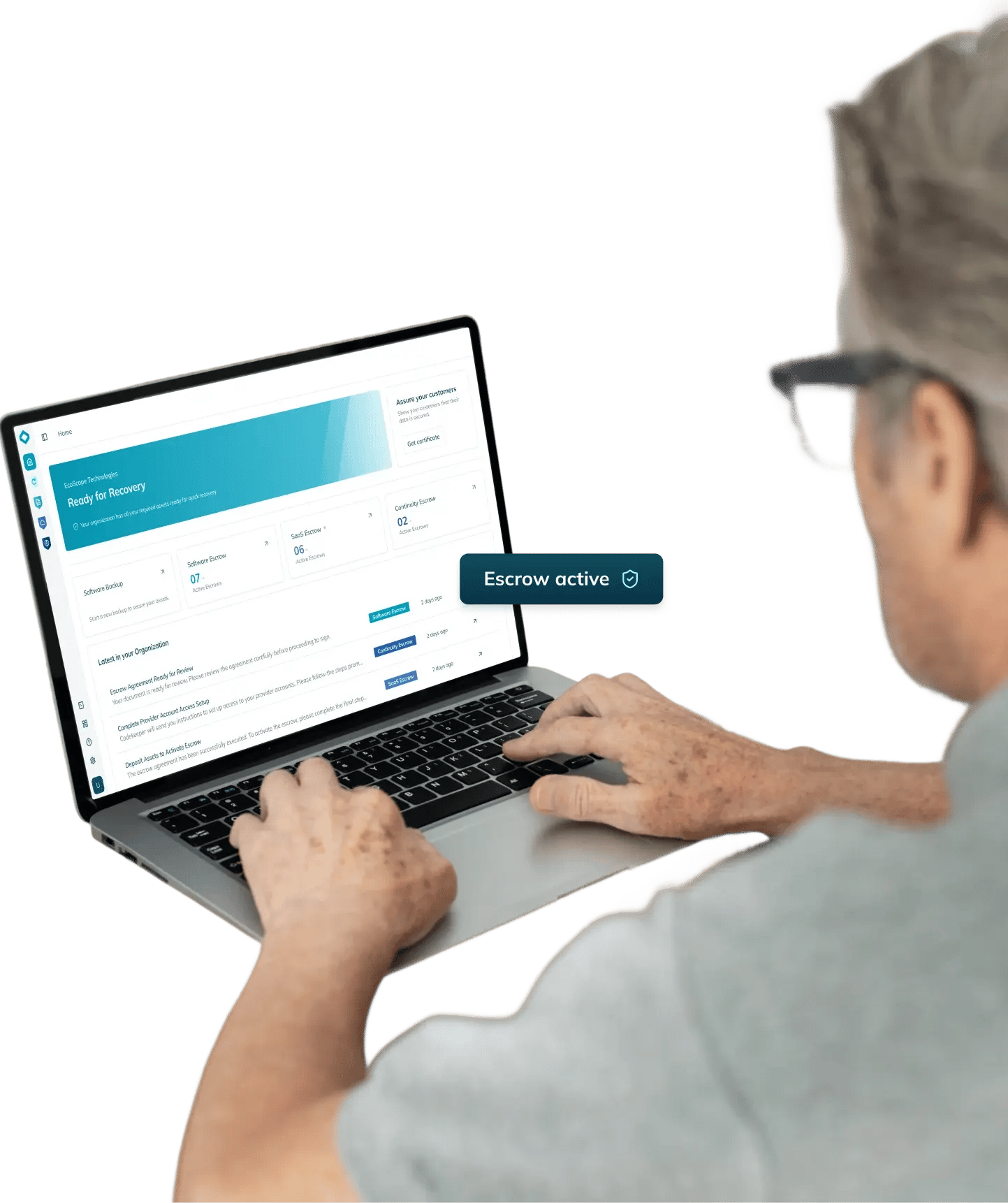 Man using a laptop with the “Ready for recovery” screen displayed.