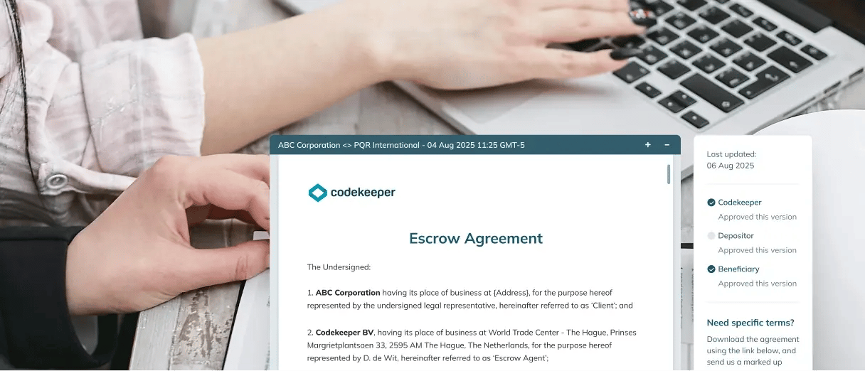 Two people working on laptops with a snippet of an escrow agreement below.